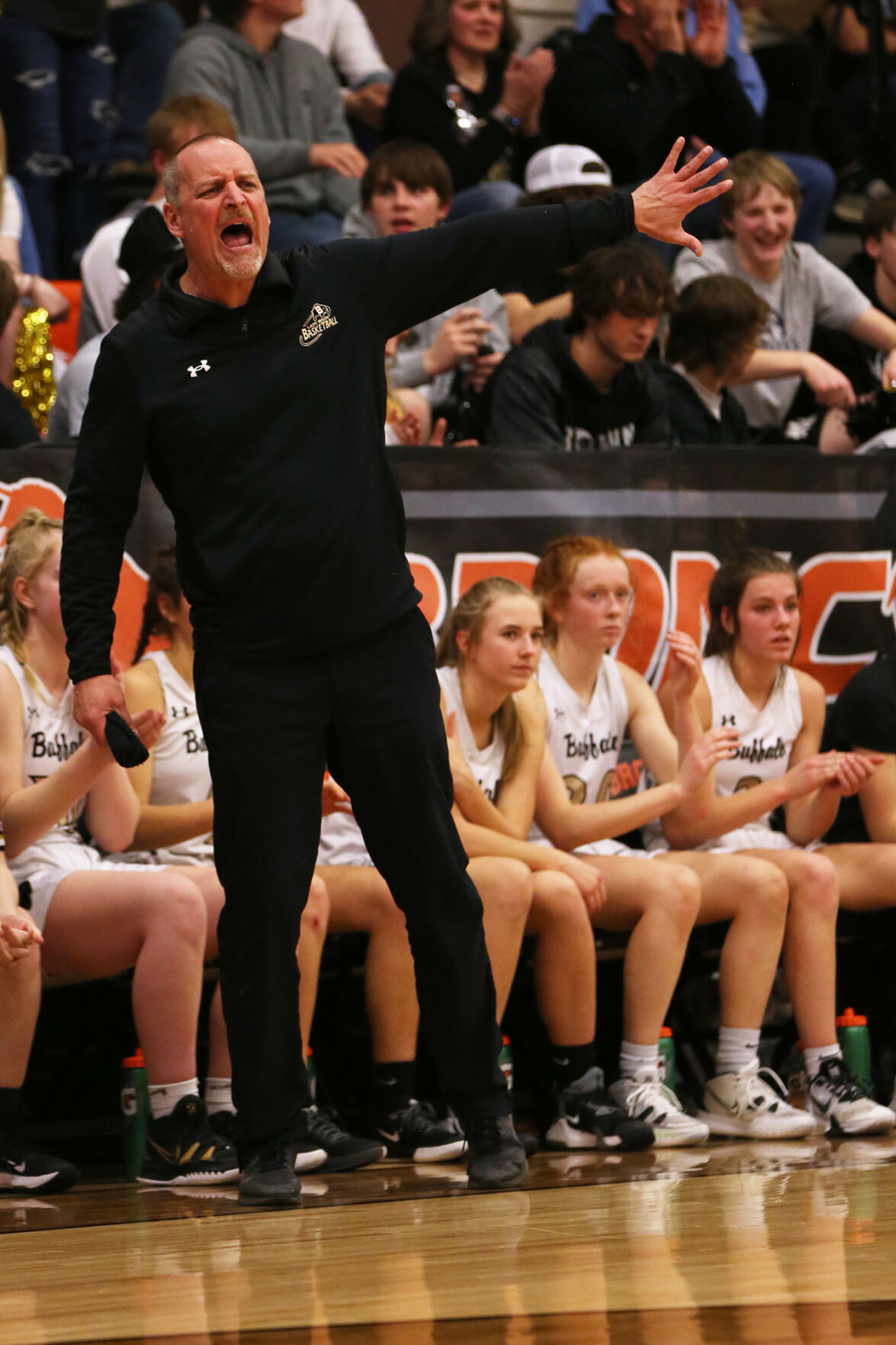 Keith Leppert yells to his team in the final minute of the game